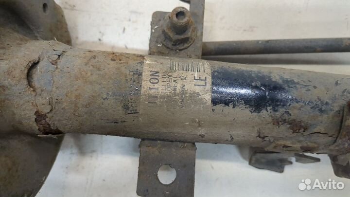 Амортизатор подвески левый передний Nissan Qashqai