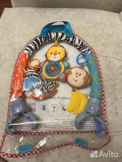 Дуга с игрушками зебра