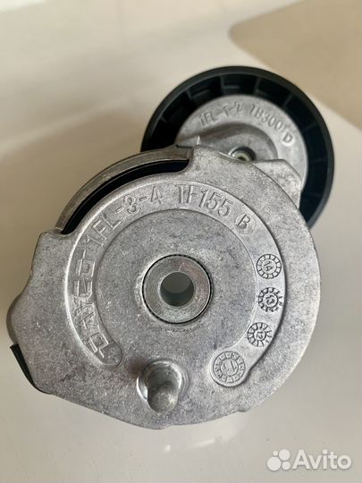 Натяжитель приводного ремня с роликом Volvo