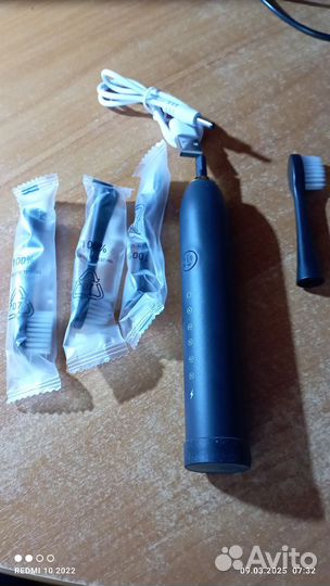 Электронная зубная щетка