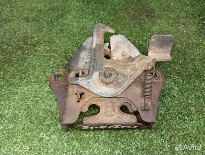 Замок капота Kia Spectra