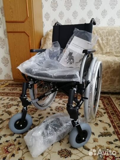 Инвалидная коляска новая