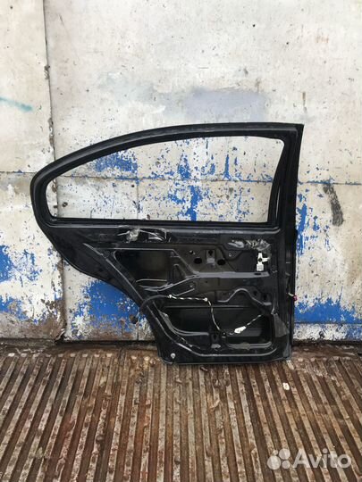 Дверь задняя левая Skoda Octavia Tour