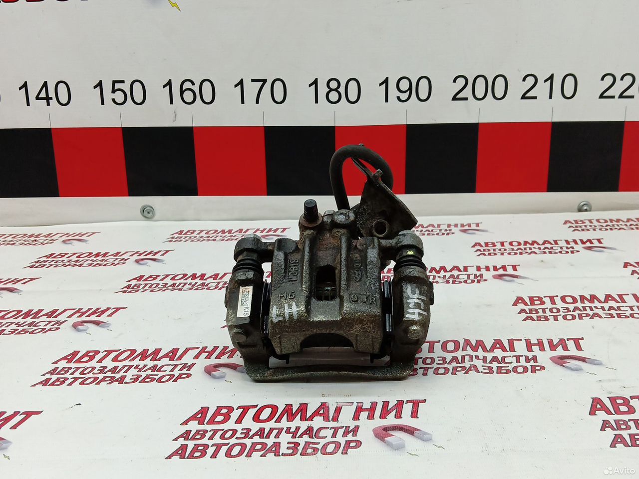 Супорт тормозной задний левый Киа Оптима 4 JF