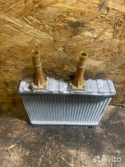Радиатор печки Ниссан Примера P12
