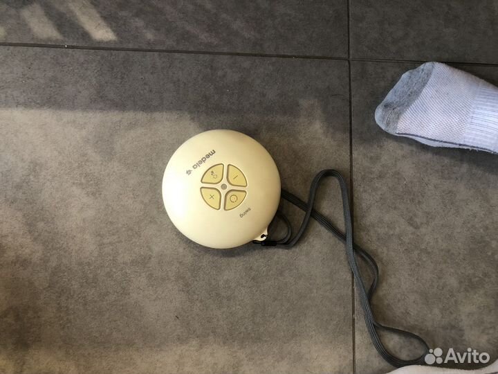 Молокоотсос medela электрический