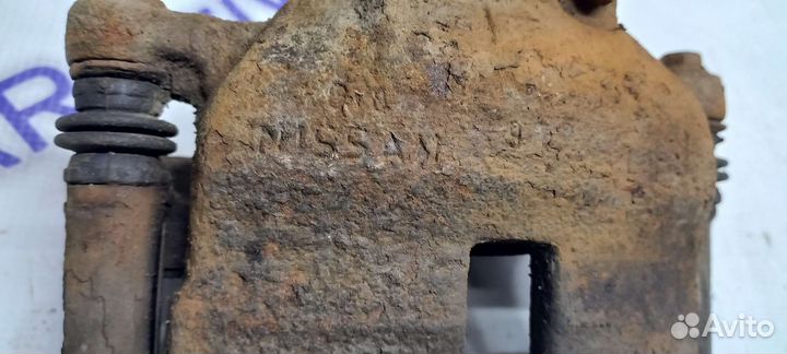 Суппорт передний левый Nissan Almera N16