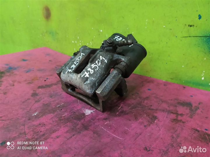 Суппорт задний левый Tiguan Passat B7 CC Audi Q3