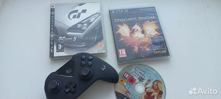 Джойстик на playstation 3 и диски с играми
