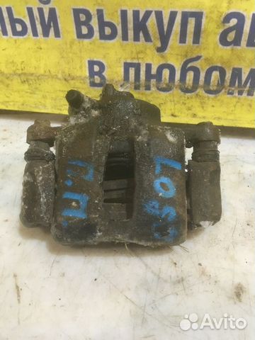 Суппорт тормозной передний правый Honda Logo