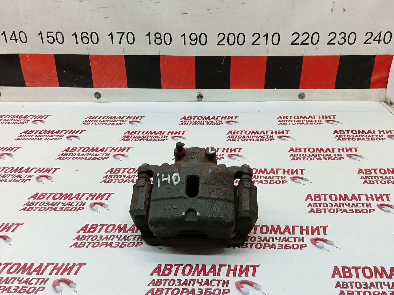 Супорт тормозной передний левый Хендай i40