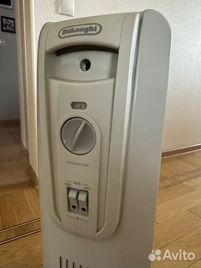 Масляный обогреватель delonghi