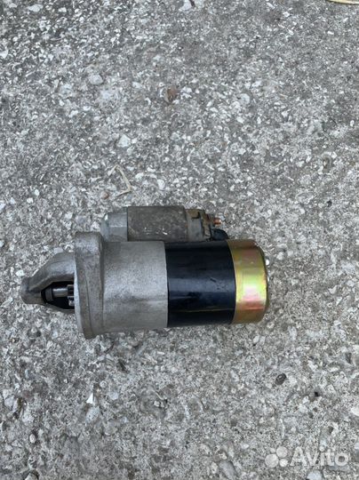 Стартер новый Geely MK