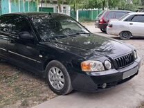 Kia Magentis 2.5 MT, 2002, битый, 200 000 км, с пробегом, цена 300 000 руб.