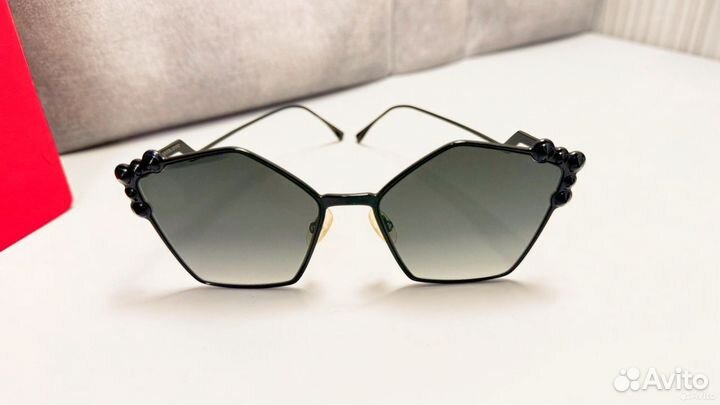 Солнечные очки женские