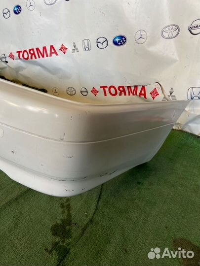 Бампер задний Toyota Carina AT210