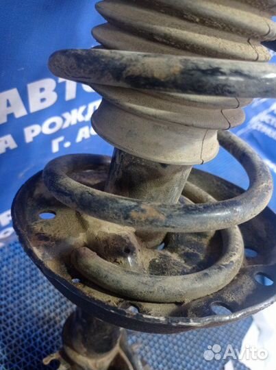 Передняя левая стойка амортизатора Opel Corsa D