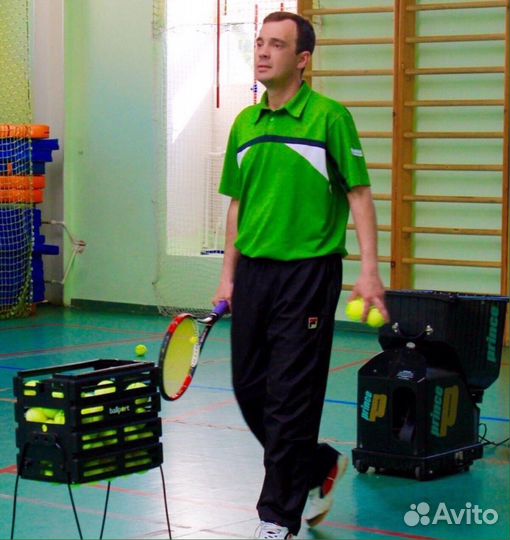 Тренер по большому теннису