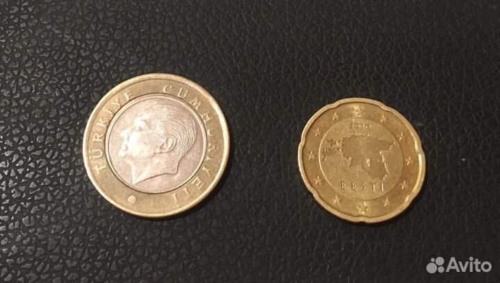 Монеты 1 лира и 20 евроцентов