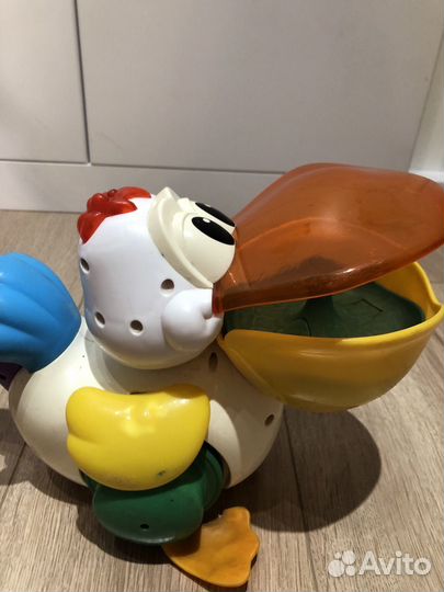 Детская каталка пеликан