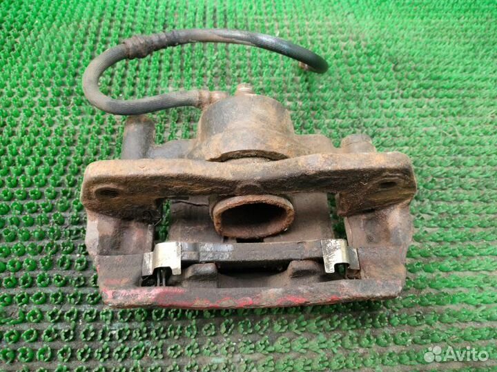 Суппорт передний левый Mazda 626 GE FS 1995