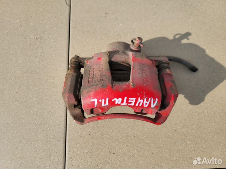 Тормозной суппорт передний левый Chevrolet Лачетти