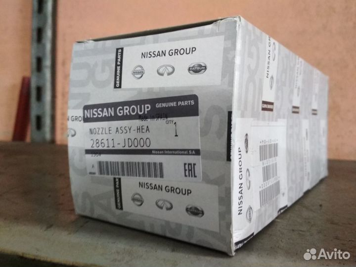 Форсунка омывателя фар