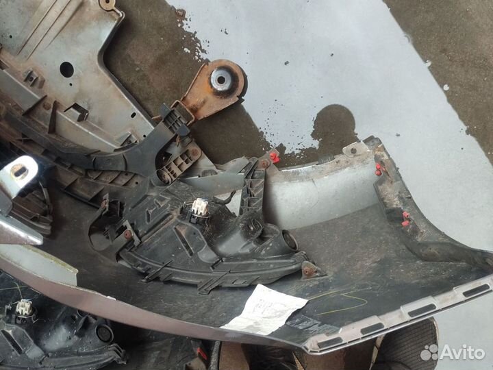 Передний бампер на Опель Астра J дорестайл