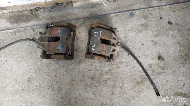 Тормозной суппорт передний Nissan Almera G15