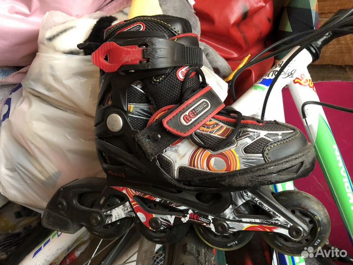 Роликовые коньки