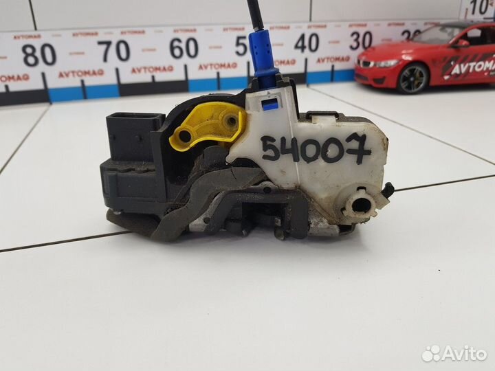 Замок двери задний левый (Opel Astra)