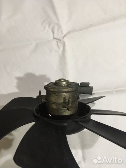 Вентилятор радиатора на митсубиси лансер 10