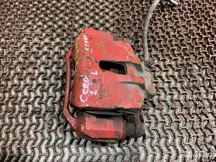 Суппорт передний левый Сид 1(дорест) Kia Ceed