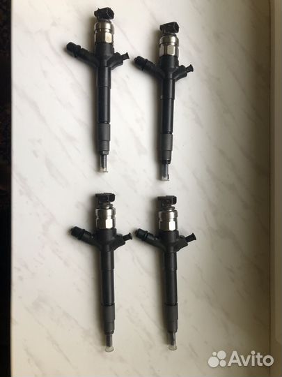 Форсунка топливная Mitsubishi L200 Denso