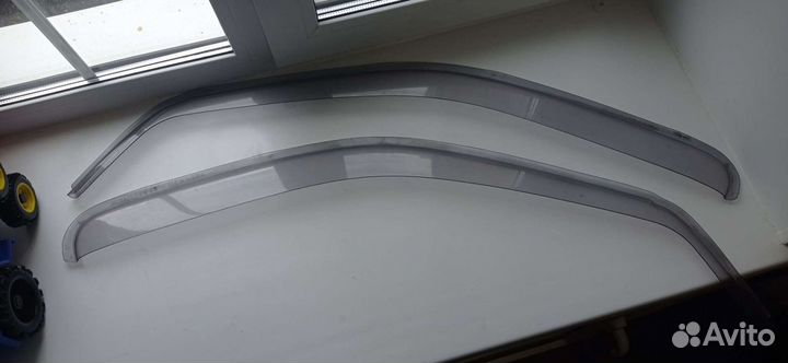 Оригинальные ветровики рено Клио, симбол