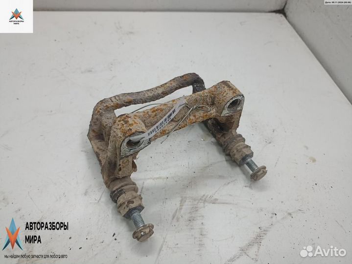 Скоба суппорта Opel Astra H/Family рест. 2005