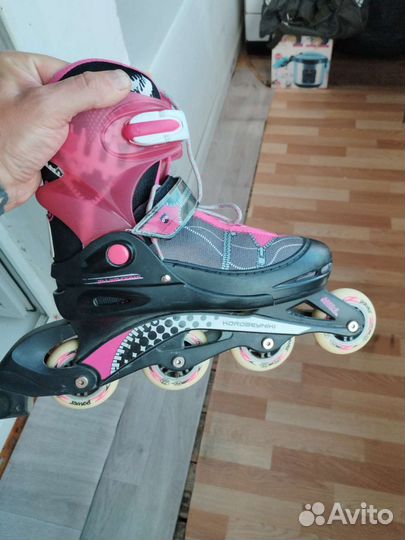 Роликовые коньки