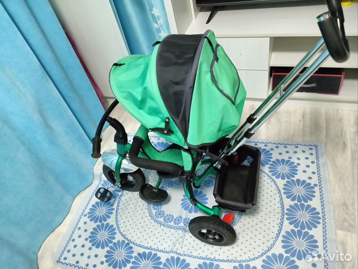 Трехколесный велосипед с ручкой