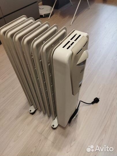 Масляный радиатор delonghi