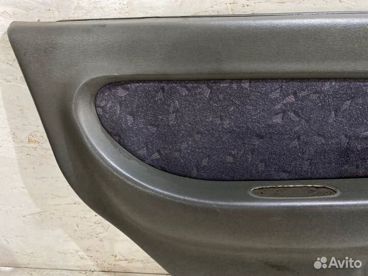 Обшивка боковой двери задняя левая Kia Spectra