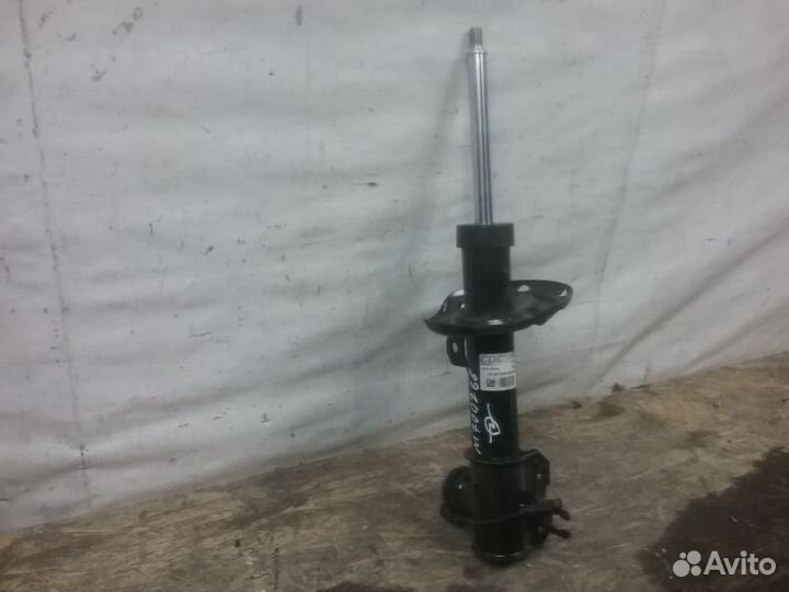 Амортизатор передний левый Opel Astra H