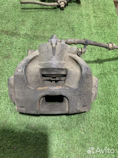 Передний левый тормозной суппорт Opel Vectra C