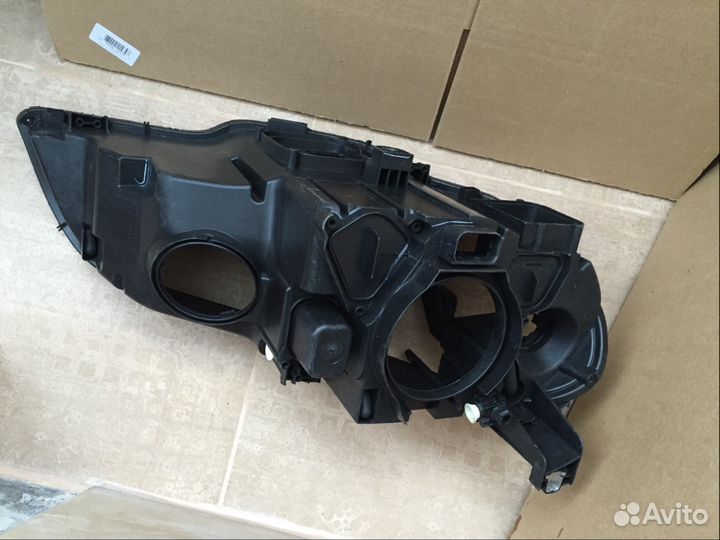 Корпус левой фары BMW X5 E70