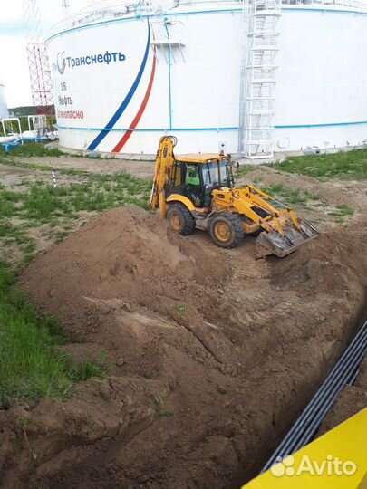Эксковатор - погрузчик