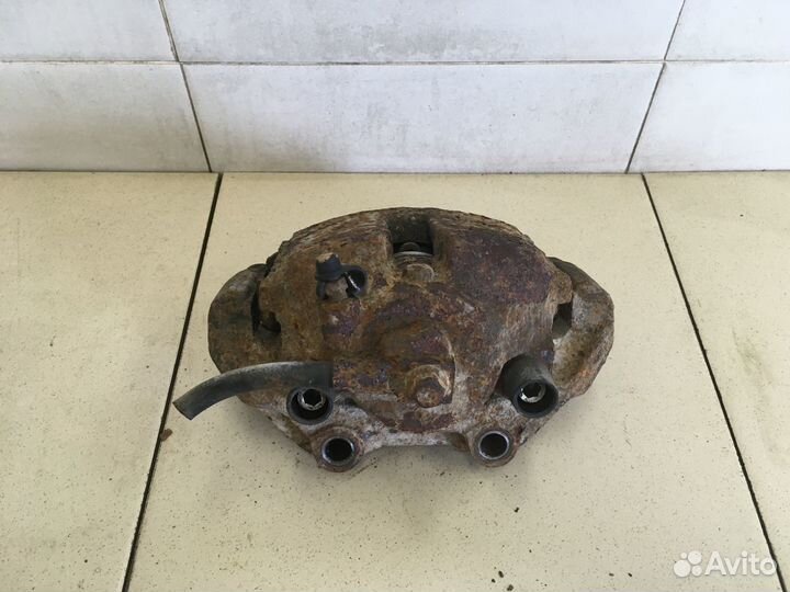 Суппорт передний левый Omega B 1994-2003