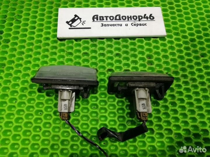 Фонарь подсветки номера Nissan Tiida C11 седан