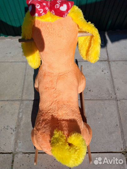 Собака качалка