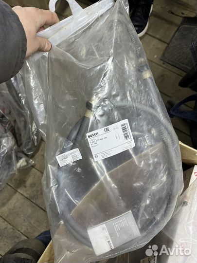 Трос стояночного тормоза logan