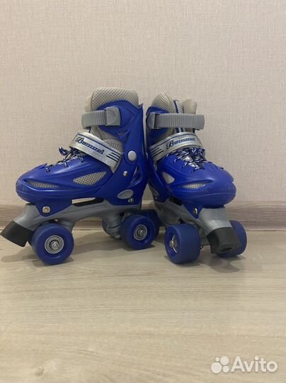 Роликовые коньки