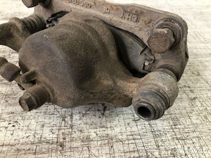 Суппорт тормозной передний правый Hyundai Accent